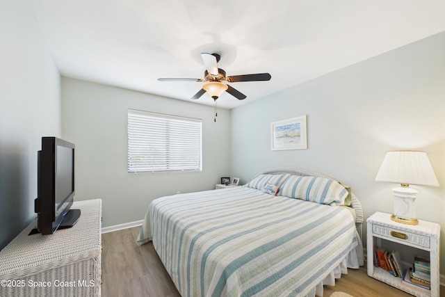 152 Clemente Dr, Satellite Beach, FL 32937 - bedroom featuring light wood-style floors and a ceiling fan