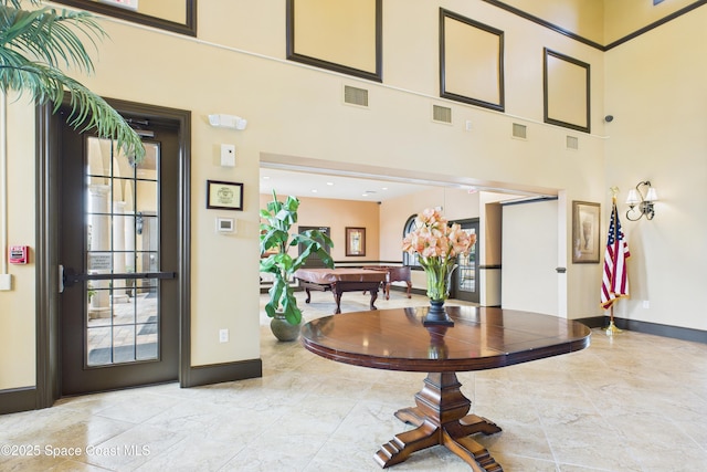 152 Clemente Dr, Satellite Beach, FL 32937 - foyer entrance with pool table and a high ceiling