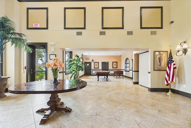 152 Clemente Dr, Satellite Beach, FL 32937 - community lobby featuring a towering ceiling