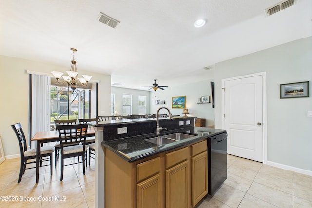 152 Clemente Dr, Satellite Beach, FL 32937 - kitchen featuring black dishwasher, light tile patterned floors, pendant lighting, ceiling fan, and an island with sink