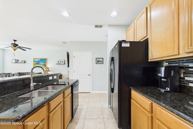 152 Clemente Dr, Satellite Beach, FL 32937 - kitchen with tasteful backsplash, black appliances, ceiling fan, dark stone counters, and light tile patterned floors