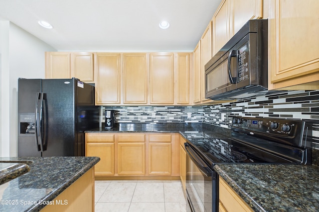 152 Clemente Dr, Satellite Beach, FL 32937 - kitchen featuring black appliances, light brown cabinets, and decorative backsplash