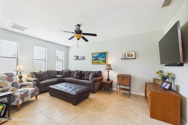 152 Clemente Dr, Satellite Beach, FL 32937 - living room featuring a ceiling fan and light tile patterned floors