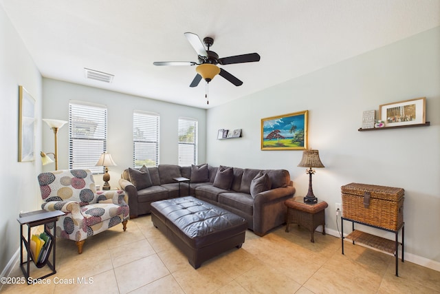 152 Clemente Dr, Satellite Beach, FL 32937 - living room with ceiling fan and light tile patterned floors
