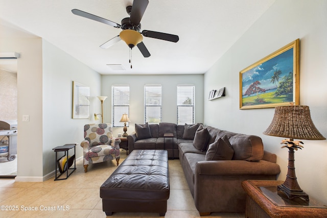 152 Clemente Dr, Satellite Beach, FL 32937 - living area with light tile patterned flooring and a ceiling fan
