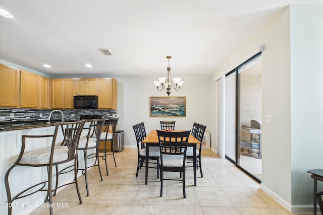 152 Clemente Dr, Satellite Beach, FL 32937 - dining space featuring a chandelier, recessed lighting, and light tile patterned flooring