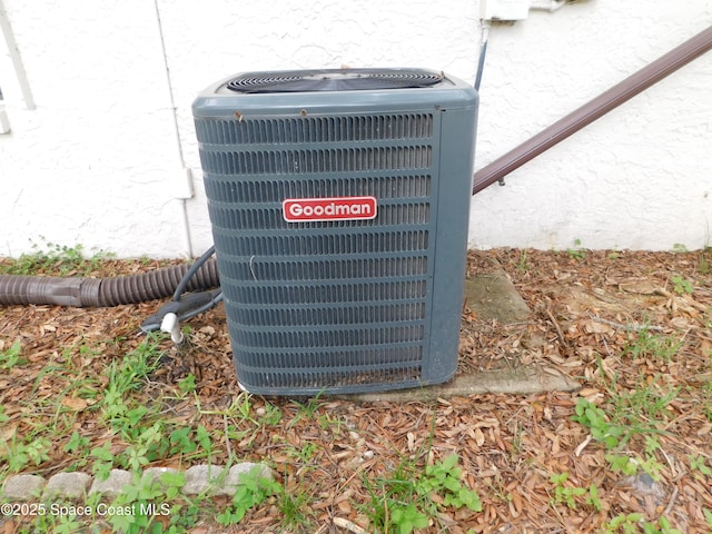 1679 Cardinal Ct, Melbourne, FL 32935 - exterior view of a central air condition unit and stucco siding