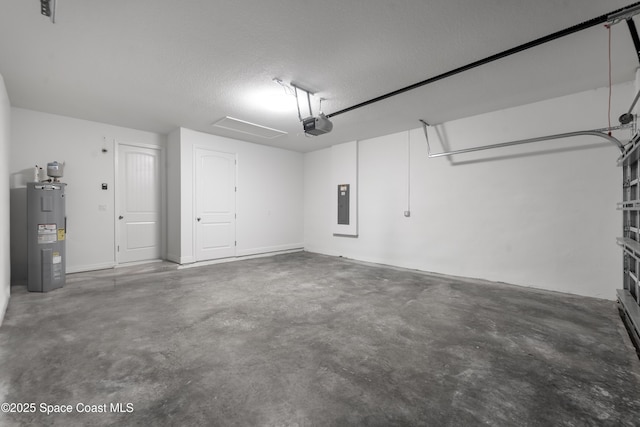 210 La Gore St, Palm Bay, FL 32908 - garage featuring electric water heater, electric panel, and a garage door opener