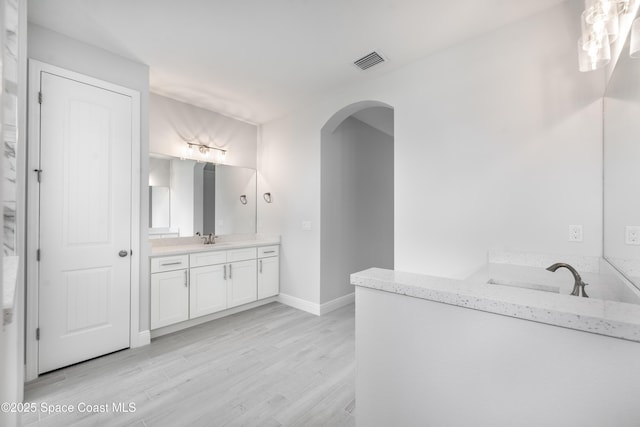 210 La Gore St, Palm Bay, FL 32908 - bathroom with vanity and wood finished floors