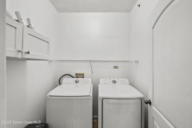 6461 Borasco Dr Unit 3808, Melbourne, FL 32940 - washroom featuring cabinet space and washing machine and dryer