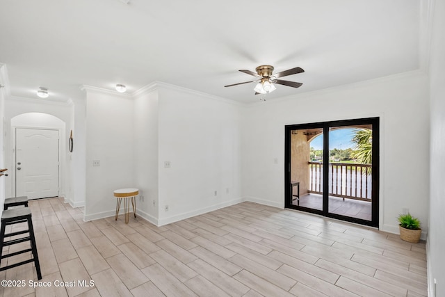 6461 Borasco Dr Unit 3808, Melbourne, FL 32940 - spare room with ornamental molding, arched walkways, ceiling fan, light wood-style floors, and a water view