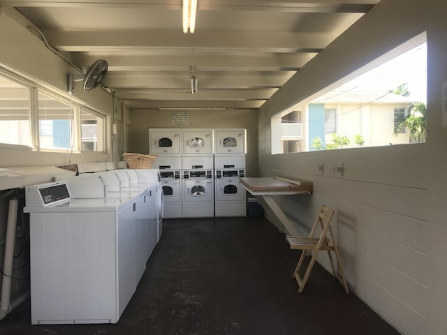 250 N Banana River Dr Unit F-11, Merritt Island, FL 32952 - shared laundry with stacked washing machine and dryer and independent washer and dryer
