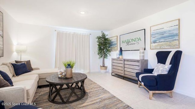 783 Kingfisher St, Palm Bay, FL 32908 - tiled living area featuring baseboards and recessed lighting