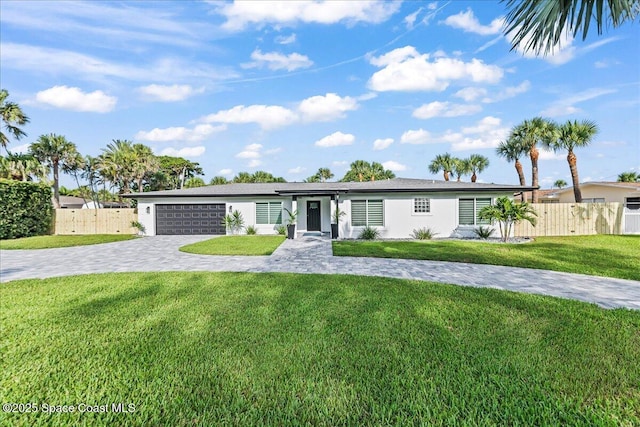 300 Oak St, Melbourne Beach, FL 32951 - view of front facade featuring decorative driveway, a garage, and stucco siding