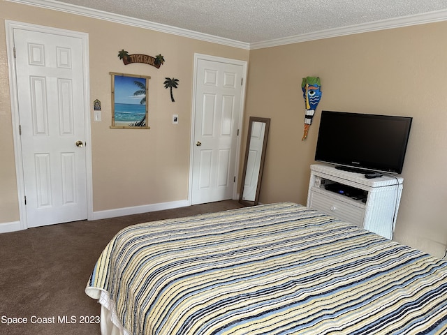 350 Taylor Ave Unit 11B2, Cape Canaveral, FL 32920 - carpeted bedroom with crown molding and a textured ceiling
