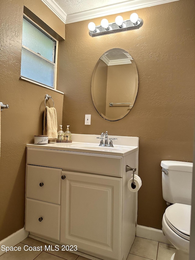 350 Taylor Ave Unit 11B2, Cape Canaveral, FL 32920 - bathroom with vanity, tile patterned floors, and ornamental molding