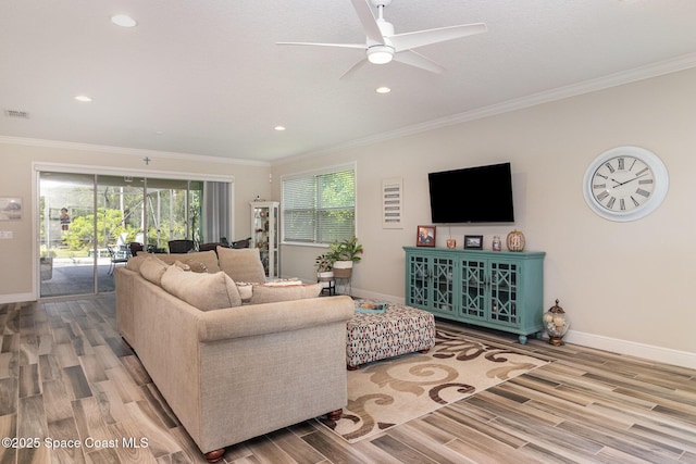 4014 Preservation Cir, Melbourne, FL 32934 - living room with wood finished floors, a ceiling fan, ornamental molding, and recessed lighting
