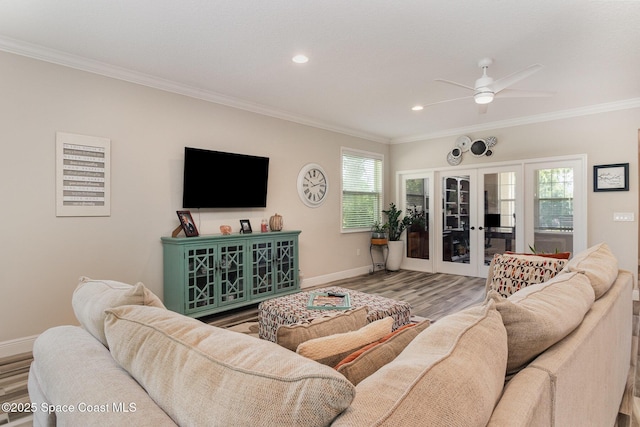 4014 Preservation Cir, Melbourne, FL 32934 - living area with crown molding, a ceiling fan, wood finished floors, french doors, and recessed lighting