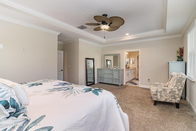 4014 Preservation Cir, Melbourne, FL 32934 - carpeted bedroom featuring a tray ceiling, ornamental molding, connected bathroom, a ceiling fan, and recessed lighting
