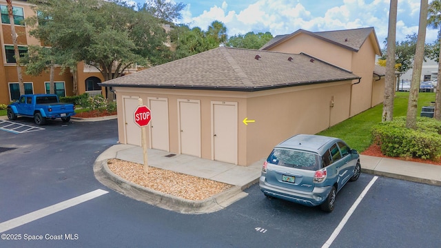 6461 Borasco Dr Unit 1805, Melbourne, FL 32940 - garage with uncovered parking