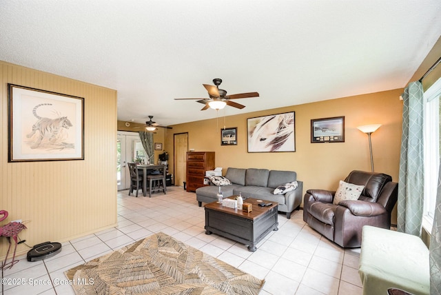 957 Stage St SE, Palm Bay, FL 32909 - living area featuring light tile patterned floors and a ceiling fan