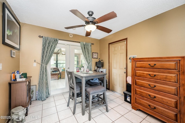 957 Stage St SE, Palm Bay, FL 32909 - dining space with french doors, a ceiling fan, and light tile patterned flooring
