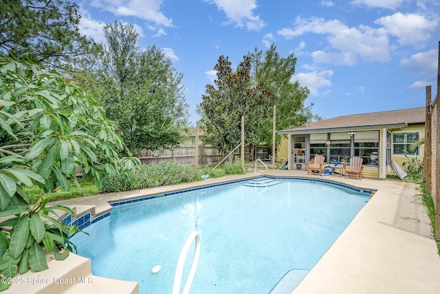 957 Stage St SE, Palm Bay, FL 32909 - view of swimming pool featuring a sunroom