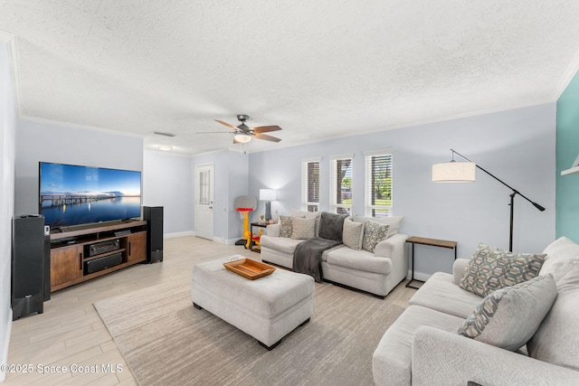 416 Catalina Ave NW, Palm Bay, FL 32907 - living area featuring a textured ceiling, ceiling fan, light wood finished floors, and ornamental molding