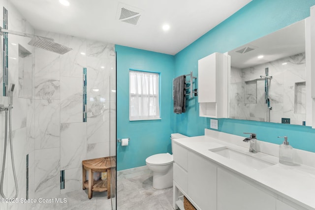 416 Catalina Ave NW, Palm Bay, FL 32907 - full bath with a marble finish shower, vanity, marble look tile flooring, and recessed lighting