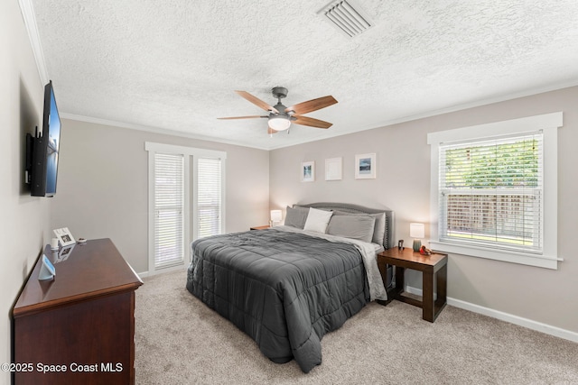 416 Catalina Ave NW, Palm Bay, FL 32907 - bedroom with ornamental molding, light colored carpet, ceiling fan, and a textured ceiling