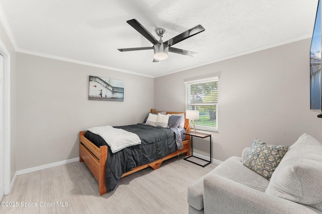 416 Catalina Ave NW, Palm Bay, FL 32907 - bedroom featuring light wood finished floors, ornamental molding, and a ceiling fan