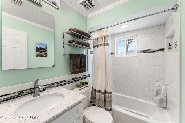 416 Catalina Ave NW, Palm Bay, FL 32907 - full bath with vanity, shower / bath combo, crown molding, and decorative backsplash