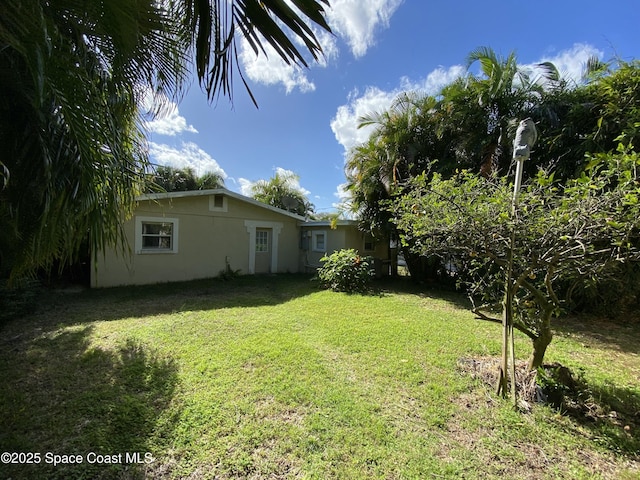 208 Johnson Ave, Cape Canaveral, FL 32920 - view of green lawn