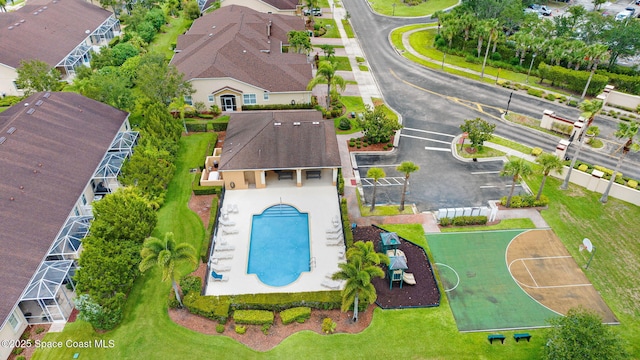 5727 Tamarac Dr, Melbourne, FL 32940 - aerial perspective of suburban area featuring a pool