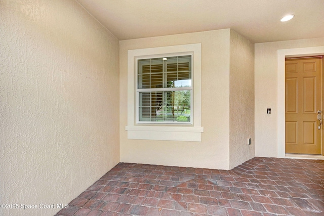 5727 Tamarac Dr, Melbourne, FL 32940 - property entrance featuring stucco siding