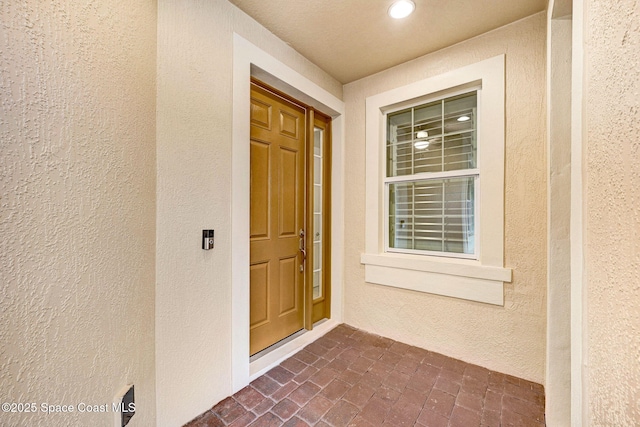 5727 Tamarac Dr, Melbourne, FL 32940 - view of exterior entry with stucco siding