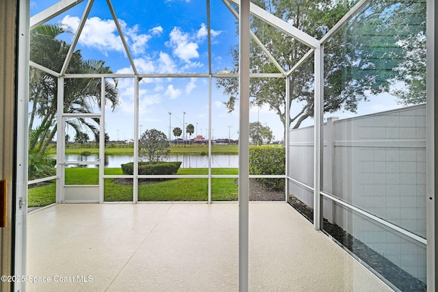 5727 Tamarac Dr, Melbourne, FL 32940 - unfurnished sunroom featuring a water view