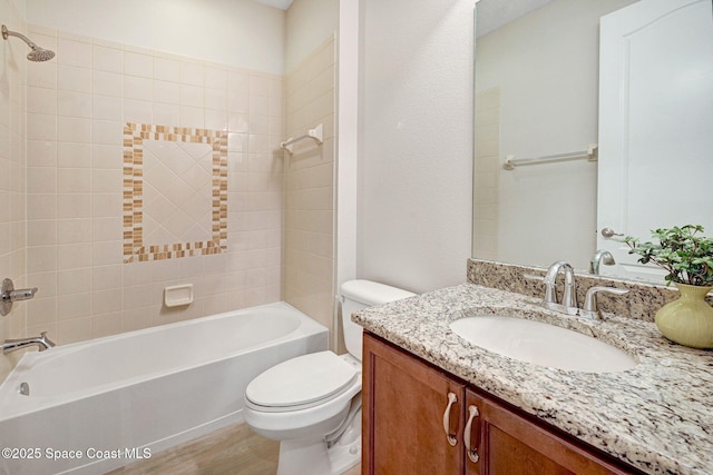 5727 Tamarac Dr, Melbourne, FL 32940 - full bath featuring vanity, shower / bath combination, and wood finished floors