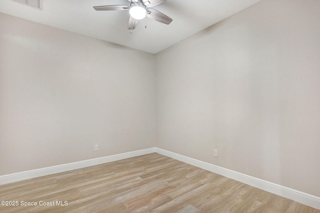 5727 Tamarac Dr, Melbourne, FL 32940 - empty room featuring light wood finished floors and ceiling fan