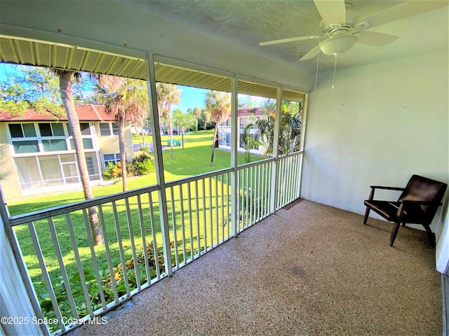 261 Cape Shores Cir Unit 18I, Cape Canaveral, FL 32920 - unfurnished sunroom with ceiling fan