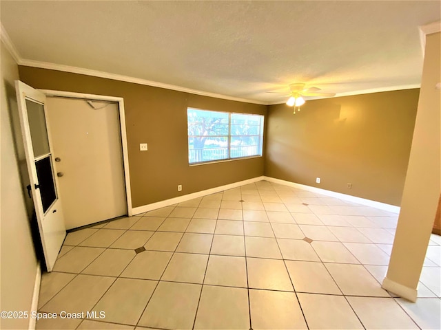 261 Cape Shores Cir Unit 18I, Cape Canaveral, FL 32920 - empty room featuring ornamental molding, ceiling fan, and light tile patterned flooring