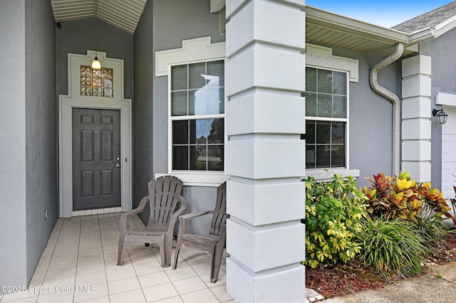 1067 Red Bud Cir, Rockledge, FL 32955 - entrance to property featuring stucco siding and covered porch