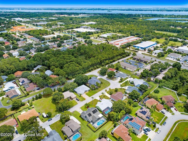 1067 Red Bud Cir, Rockledge, FL 32955 - aerial view of residential area featuring a nearby body of water