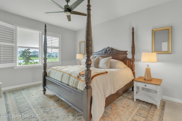 10035 SW Captiva Dr, Port St Lucie, FL 34987 - bedroom with baseboards and a ceiling fan