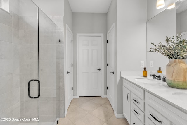 10035 SW Captiva Dr, Port St Lucie, FL 34987 - full bathroom with a shower stall, double vanity, and tile patterned floors