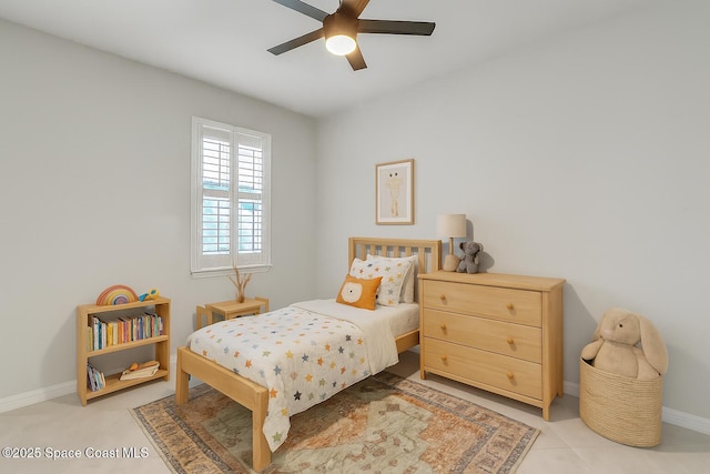 10035 SW Captiva Dr, Port St Lucie, FL 34987 - bedroom featuring ceiling fan and light tile patterned flooring