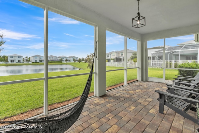10035 SW Captiva Dr, Port St Lucie, FL 34987 - sunroom / solarium with a water view and a residential view