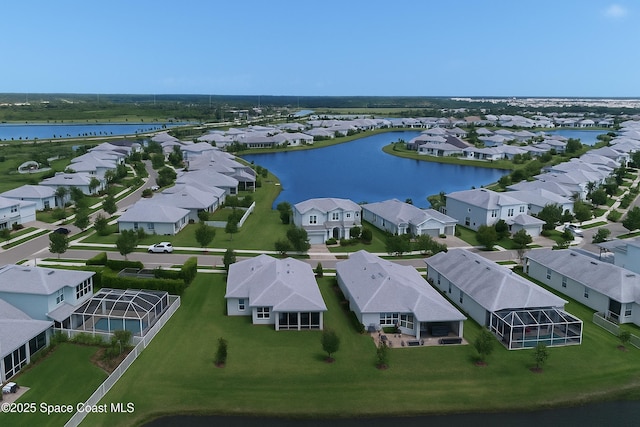 10035 SW Captiva Dr, Port St Lucie, FL 34987 - aerial perspective of suburban area featuring a large body of water