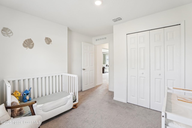 982 Pyracantha St NW, Palm Bay, FL 32907 - carpeted bedroom featuring a closet and baseboards