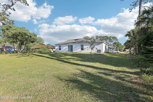 982 Pyracantha St NW, Palm Bay, FL 32907 - view of grassy yard